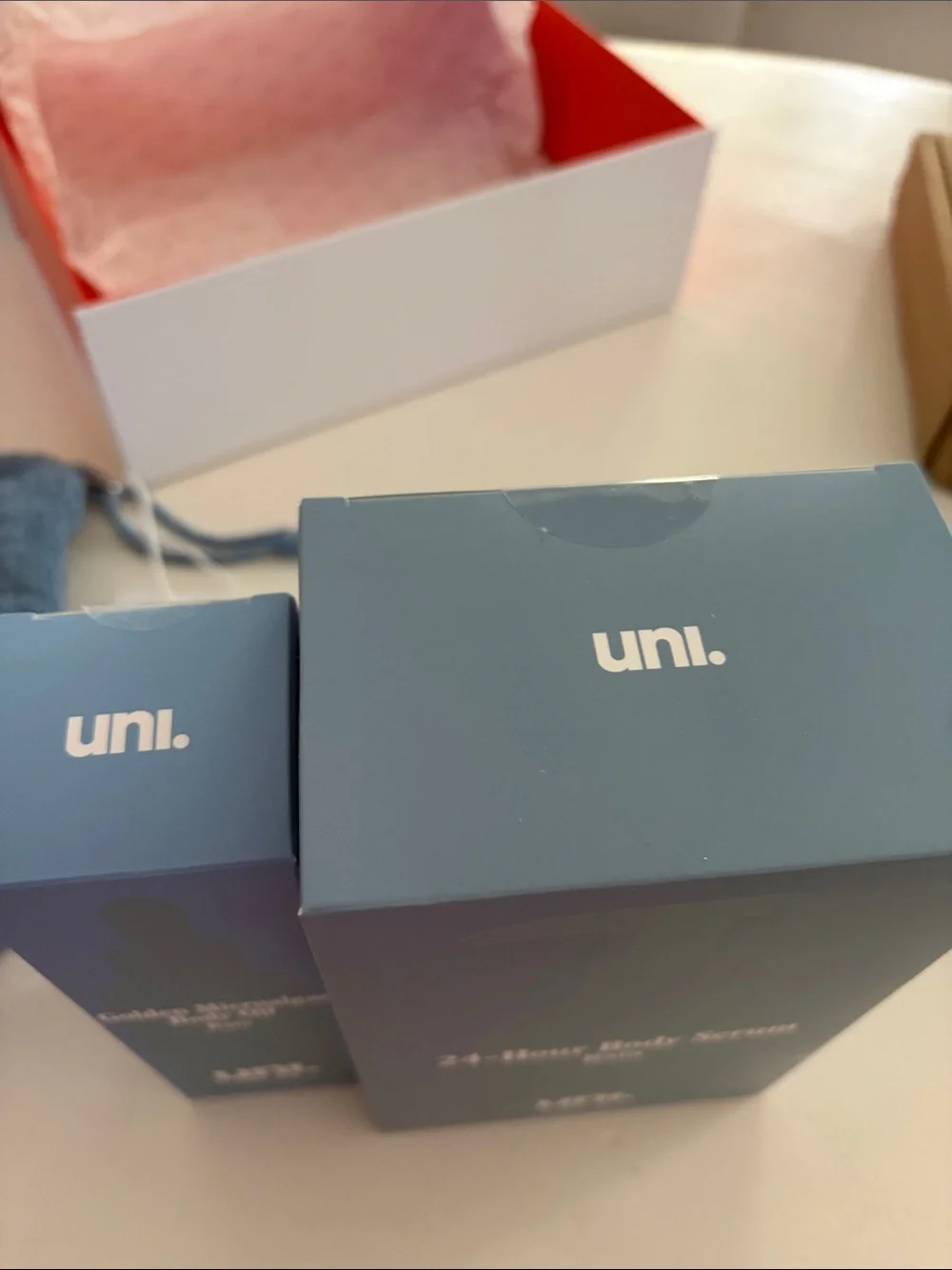 UNI rain body serum and body oil